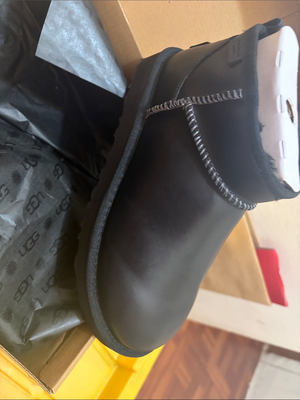 UGG Women’s Short Black Leather Boot with Contrast Stitch